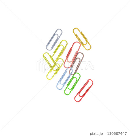 Colorful paper clips arranged in separate groups on a white background. 130687447