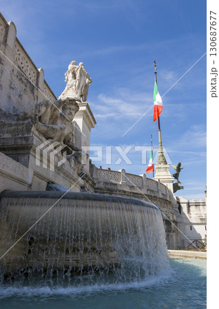 Rome, Italy - August 16, 2019: Adriatic fountain located at the northeast wall of the Vittoriano complex on Venice Square in Rome. Rome, Italy - August 16, 2019: Adriatic fountain located at the northeast wall of the Vittoriano complex on Venice Square in Rome. 130687677