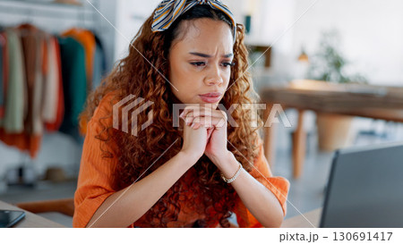 Fashion designer, woman thinking and laptop for e commerce ideas, problem solving and market research. Young entrepreneur or clothes seller reading reviews on computer, online shop profit or solution 130691417