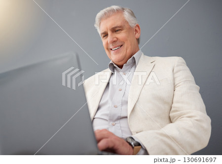 Senior business man, laptop and studio background for planning, online strategy and email website. Happy executive ceo working on computer technology, corporate management and professional smile 130691697
