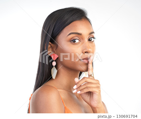 Portrait, Indian woman and finger on lips for secret, privacy and girl isolated on white studio background. Face, female and lady with gesture for silence, private and emoji for quiet and whisper Portrait, Indian woman and finger on lips for secret, privacy and girl isolated on white studio background. Face, female and lady with gesture for silence, private and emoji for quiet and whisper 130691704