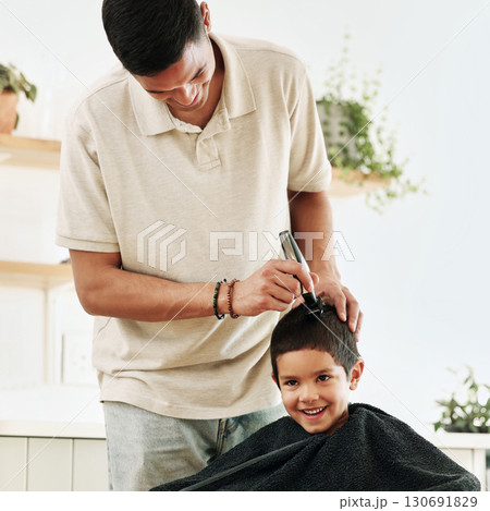 Family, children and haircut with a father shaving the hair of his son together in the home for grooming. Kids, barber and hairstyle with a man cutting the head of his son as a hairdresser in a house Family, children and haircut with a father shaving the hair of his son together in the home for grooming. Kids, barber and hairstyle with a man cutting the head of his son as a hairdresser in a house 130691829