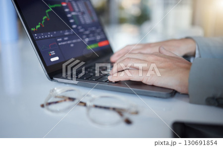 Hands, laptop and typing in trading for cryptocurrency, NFT or blockchain monitoring, chart or profit of investment. Hand of trader, investor or broker with computer on stock market for ecommerce Hands, laptop and typing in trading for cryptocurrency, NFT or blockchain monitoring, chart or profit of investment. Hand of trader, investor or broker with computer on stock market for ecommerce 130691854