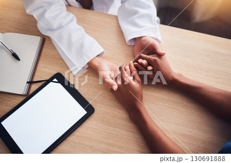 Doctor holding hands, tablet mockup and patient consultation support, healthcare services and test results advice. Digital screen, product placement space and medical people empathy and helping above 130691888