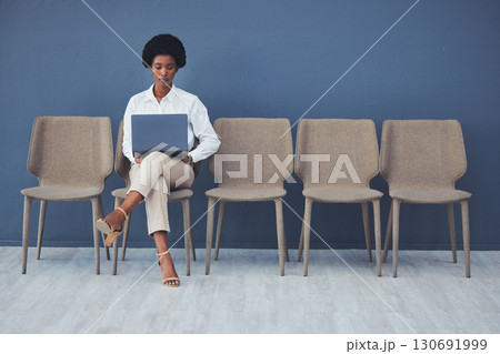 Black woman, laptop and focus for interview on chair with email, waiting and ready for job opportunity. Young african businesswoman, recruitment and mockup with computer for typing, research and goal Black woman, laptop and focus for interview on chair with email, waiting and ready for job opportunity. Young african businesswoman, recruitment and mockup with computer for typing, research and goal 130691999