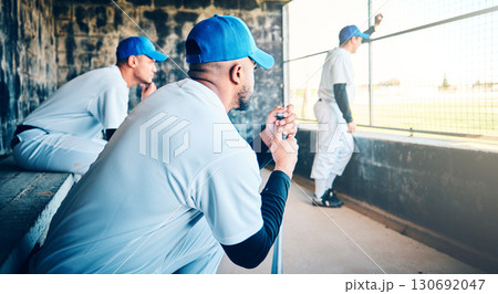 Baseball, watching game and men with fitness, club uniform and focus with healthy lifestyle. Male athletes, players and team with confidence, motivation and waiting on bench to play and teamwork 130692047