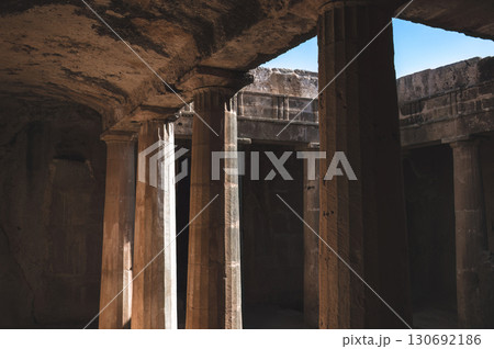 Ancient stone columns of the Tombs of the Kings, creating a captivating scene of history and architecture in Paphos, Cyprus Ancient stone columns of the Tombs of the Kings, creating a captivating scene of history and architecture in Paphos, Cyprus 130692186