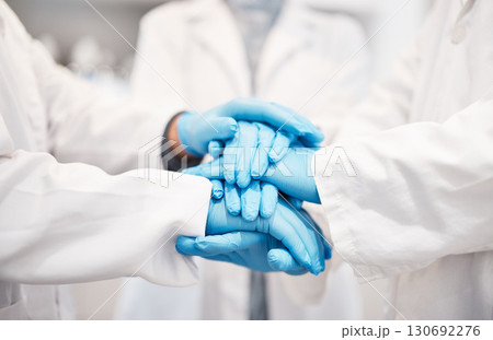 Doctor, team and hands together with gloves in healthcare, partnership or trust for collaboration, unity or support at lab. Group of medical experts piling hand in teamwork for motivation or safety Doctor, team and hands together with gloves in healthcare, partnership or trust for collaboration, unity or support at lab. Group of medical experts piling hand in teamwork for motivation or safety 130692276