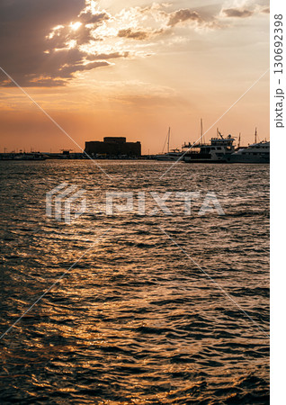 Paphos Castle reflecting on the sea at sunset in Cyprus Paphos Castle reflecting on the sea at sunset in Cyprus 130692398