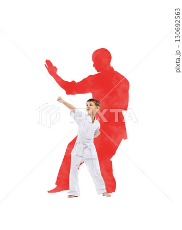 Collage of boy karate fighter in white kimono striking pose inside red athlete silhouette 130692563
