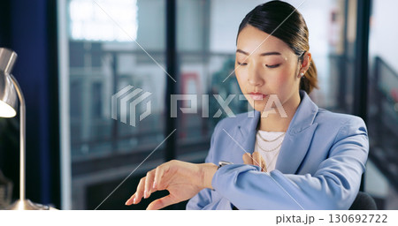 Watch, deadline and business woman in office or working late for overtime on report. Professional, corporate and dedication with asian female employee at work to check time for schedule in workplace 130692722
