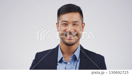 Studio, happy or portrait of Asian man in business with confidence, mockup space or ambition. Professional banker, economist or proud accountant on white background for about us or career opportunity 130692725