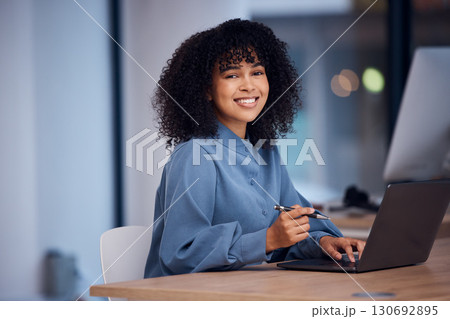 Happy, working and portrait of a black woman on a laptop for email, connection and internet. Business, smile and employee typing on a computer for online work, project and freelancing in office Happy, working and portrait of a black woman on a laptop for email, connection and internet. Business, smile and employee typing on a computer for online work, project and freelancing in office 130692895