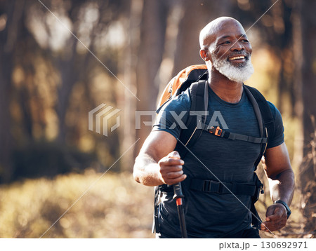 Fitness, hiking and smile with black man in forest for freedom, health and sports training. Exercise, peace and wellness with senior hiker trekking in nature for travel, summer break and adventure Fitness, hiking and smile with black man in forest for freedom, health and sports training. Exercise, peace and wellness with senior hiker trekking in nature for travel, summer break and adventure 130692971