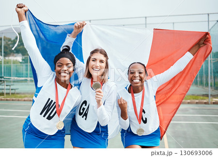 Netball win, flag portrait and sports team celebration, excited or celebrate award winner, competition victory or game. France group success, teamwork achievement or athlete happy for prize medal 130693006
