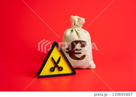 Euro money bag with reduced budget. Symbol of austerity, fiscal tightening, and saving programs. Suitable for government policy, debt management, and EU economy. 130693807