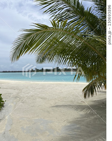 Paradise Beach Day in Maldives: White Sand and Turquoise Ocean Paradise Beach Day in Maldives: White Sand and Turquoise Ocean 130693896