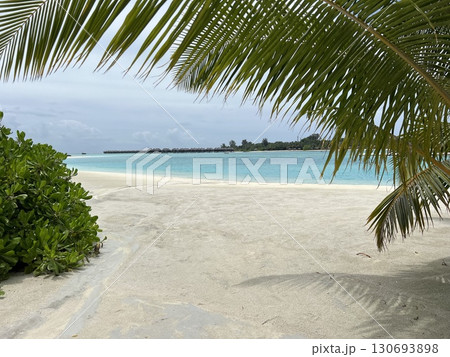Paradise Beach Day in Maldives: White Sand and Turquoise Ocean Paradise Beach Day in Maldives: White Sand and Turquoise Ocean 130693898