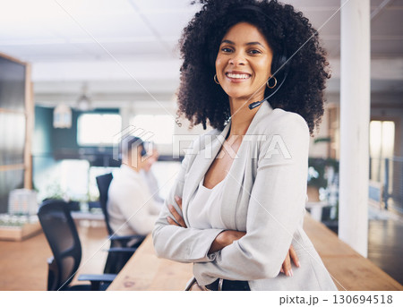 Portrait, customer service and support with a black woman consultant working in her telesales office. Contact us, call center and telemarketing with a female employee consulting using a headset 130694518