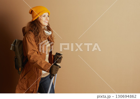 Smiling Hiker with Backpack and Hiking Poles 130694862