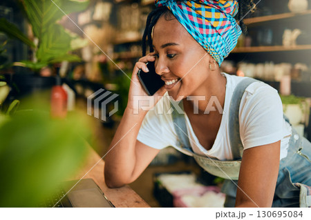 Phone call, small business or black woman talking or networking with startup agro retail supplier. Management, store manager or happy young entrepreneur planning or speaking of floral development job 130695084