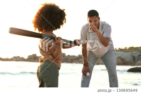 Baseball, father and girl play at beach, having fun and enjoying holiday together. Care, exercise and happy man pointing at kid or foster child while playing sports and bonding by seashore at sunset. 130695649