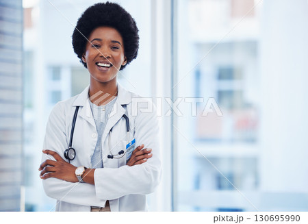 Medical, smile and happy with portrait of doctor for for healthcare, expert and professional. Medicine, wellness and surgeon with black woman and arms crossed for proud, confidence or life insurance Medical, smile and happy with portrait of doctor for for healthcare, expert and professional. Medicine, wellness and surgeon with black woman and arms crossed for proud, confidence or life insurance 130695990