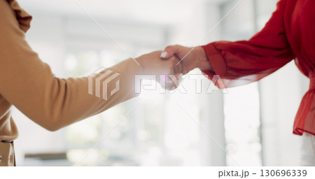 Creative people, handshake and meeting in thank you, hiring or deal together for teamwork at office. Employees shaking hands in partnership, agreement or recruiting for job in startup at workplace Creative people, handshake and meeting in thank you, hiring or deal together for teamwork at office. Employees shaking hands in partnership, agreement or recruiting for job in startup at workplace 130696339
