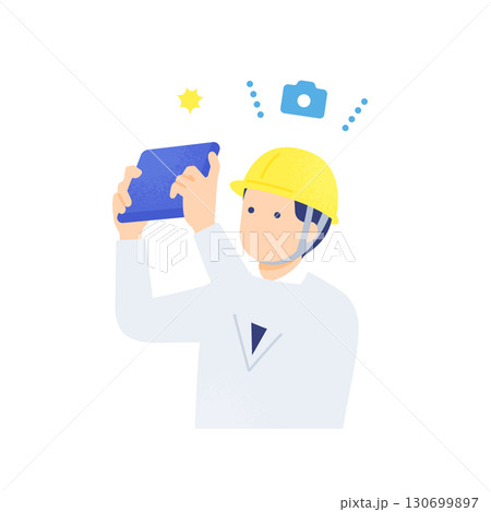 タブレットを使い建設現場で写真撮影や測量を行う現場監督 130699897