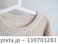 A cozy knitted sweater, perfect for staying warm in winter. 130703281