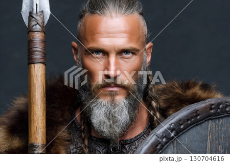 Weapon wielding viking warrior king with spear and shield Weapon wielding viking warrior king with spear and shield 130704616