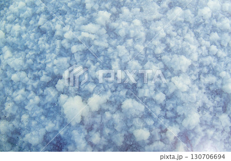 Close-up of salt crystals on the lake surface, unique natural texture Close-up of salt crystals on the lake surface, unique natural texture 130706694