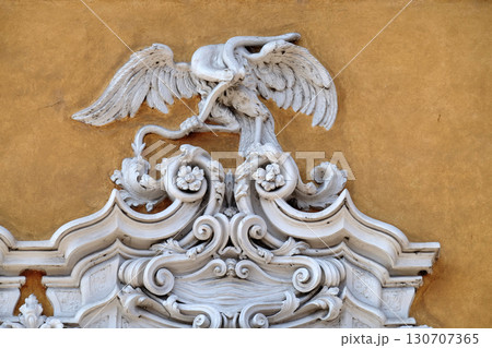 Beautiful house facade with carved stone animals in Mantua, Italy Beautiful house facade with carved stone animals in Mantua, Italy 130707365