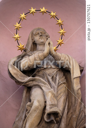 Virgin Mary statue on the facade of the Saint Francis church in Budapest, Hungary Virgin Mary statue on the facade of the Saint Francis church in Budapest, Hungary 130707621