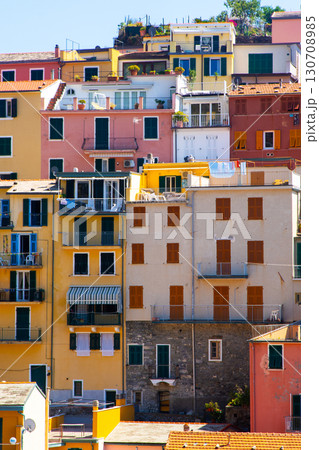 Multicolored houses on cliff edge. Manarola Italian village Cinque Terre, Liguria, Italy city architecture 130708985