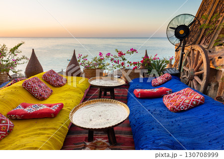 Vintage Arabic oriental cafe. Place to relax on beach Ras Umm El Sid of Red Sea. Sharm El Sheikh, Egypt. High quality photo Vintage Arabic oriental cafe. Place to relax on beach Ras Umm El Sid of Red Sea. Sharm El Sheikh, Egypt. High quality photo 130708999