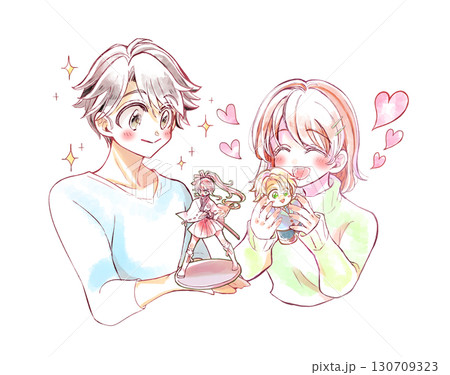 推しのグッズをもつ笑顔の男女 推しのグッズをもつ笑顔の男女 130709323