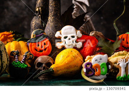 Halloween cookies in shape of ghost, jack-o-lantern and skull 130709341