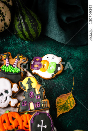 Halloween cookies in shape of ghost, jack-o-lantern and skull 130709342