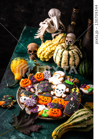 Halloween cookies in shape of ghost, jack-o-lantern and skull 130709344