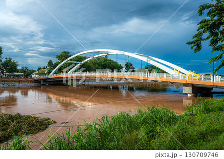 Chan Palace Bridge over the Nan River rises Chan Palace bridge blue sky background New Landmark It is a major tourist is Public places attraction Phitsanulok at daytime 130709746