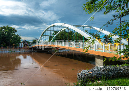 Chan Palace Bridge over the Nan River rises Chan Palace bridge blue sky background New Landmark It is a major tourist is Public places attraction Phitsanulok at daytime Chan Palace Bridge over the Nan River rises Chan Palace bridge blue sky background New Landmark It is a major tourist is Public places attraction Phitsanulok at daytime 130709748