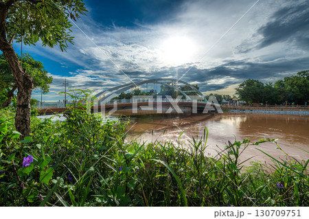 Chan Palace Bridge over the Nan River rises Chan Palace bridge blue sky background New Landmark It is a major tourist is Public places attraction Phitsanulok at daytime 130709751