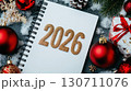 Festive new year 2026 celebration with red ornaments and snowy background 130711076