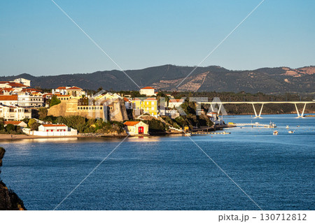Sao Clemente fort in Vila Nova de Milfontes, Portugal at sunset. The fort is in the historical part of town Sao Clemente fort in Vila Nova de Milfontes, Portugal at sunset. The fort is in the historical part of town 130712812