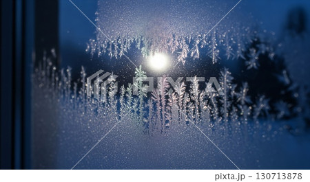 Abstract Frost Pattern on Windowpane at Night with Winter Blue Tone and Backlit Light 130713878