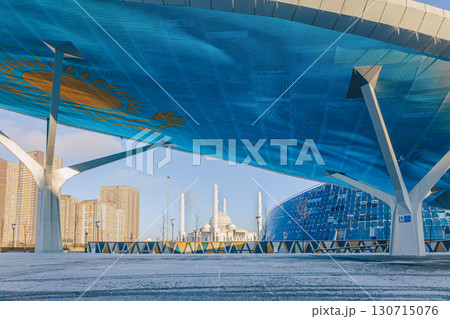 Modern architectural urbanistic city Astana. Futuristic buildings, mosque, Nur-Sultan, Astana, Kazakhstan. High quality photo 130715076