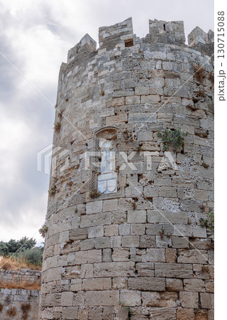 Stone powerful walls of old city, the ancient defense of Old Town, Rhodes, Dodecanese, Greece. High quality photo 130715088