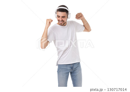 Man dances joyfully with headphones on, isolated, PNG 130717014