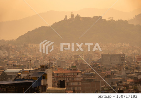 The cityscape of Kathmandu the capital city of Nepal during sunset. The city located in the bowl-shaped Kathmandu Valley of central Nepal. The cityscape of Kathmandu the capital city of Nepal during sunset. The city located in the bowl-shaped Kathmandu Valley of central Nepal. 130717192
